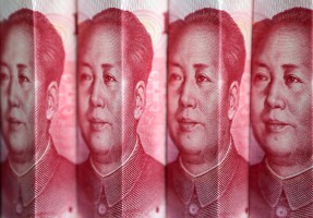 Китай запустил международную платежную систему в юанях   