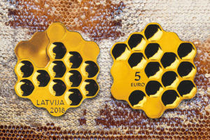 В Европе появилась монета в виде пчелиных сот