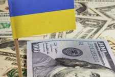 Попри військові дії Україна продовжує погашати свої борги