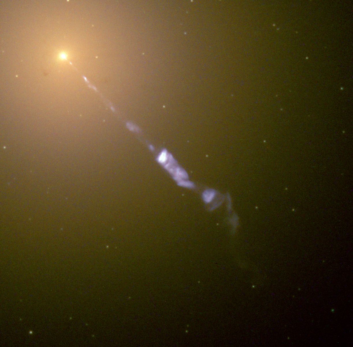 Викид струменя плазми з ядра галактики М87. Фото: NASA