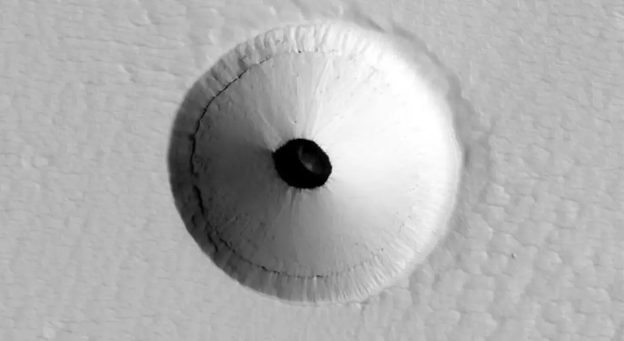 Ученые нашли неизвестное отверстие на поверхности Марса